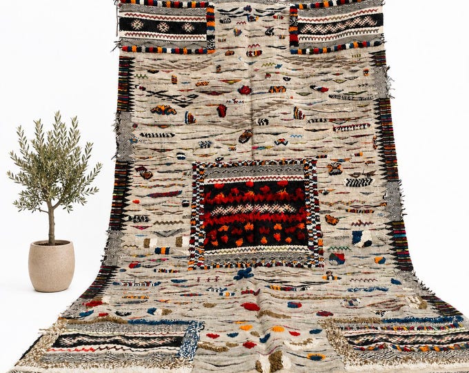 Handwoven Berber Moroccan Wool Carpet with Silk Accents – 9x5.4 Kilim Rug