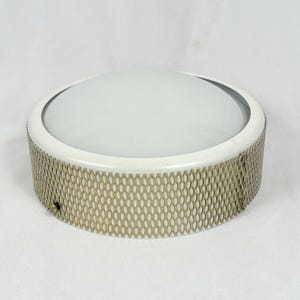 May include: A round flush mount ceiling light fixture featuring a central frosted white glass dome. The exterior frame is finished in white and is wrapped in a decorative gold-toned metal mesh with a repeating diamond-shaped lattice pattern.