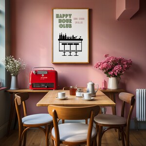 May include: A red and black vintage-style electric heater sits on a wooden table in a dining room. The table is set with four chairs, a teapot, and four cups and saucers. A framed poster with the text "Happy Hour Club" hangs on a pink wall.