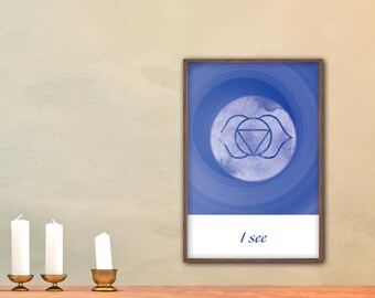 May include: A framed print with a blue and white watercolor illustration of the third eye chakra, also known as the Ajna chakra. The print has a white background with the text "I see" at the bottom.