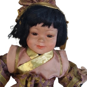 Vintage Porcelain Doll . Cute Asian doll dressed in national costume 16" tall rare and unusual doll