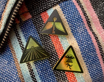 Mini Acrylic Pins | UFO Abduction & Eye Examination Warning Signs