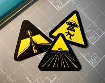 In der Dunkelheit leuchten Warnschild Aufkleber | UFO-Alien-Entführung | Augen-Untersuchung