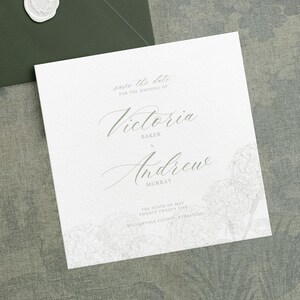 May include: Save the date card with a floral design. The card is white with gray text. The text reads "Save the date for the wedding of Victoria Baker & Andrew Murray. The tenth of May, twenty twenty five. Willowvale County, Verstead."