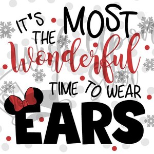 May include: A graphic design with the text "It's the most wonderful time to wear ears." The text is in black and red, with a Minnie Mouse ear design. The background is white with gray polka dots and snowflakes.