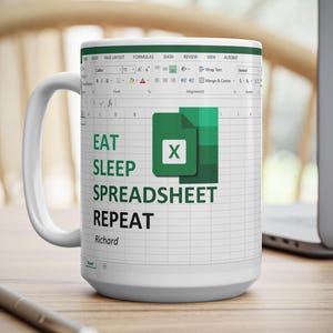 May include: White ceramic mug with a green and white Microsoft Excel logo and the text "Eat Sleep Spreadsheet Repeat Richard".