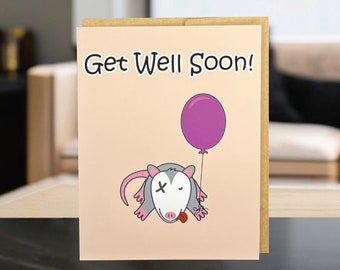 Silly get well soon card, opossum with balloon card, cute opossum playing dead card, fast recovery card, speedy recovery card wishes