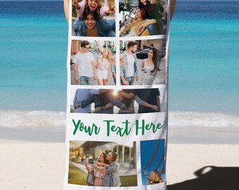 May include: White beach towel featuring a collage of photos and the text "Your Text Here" in green. The towel displays various images of people. The background shows a beach with blue water and a sandy shore.