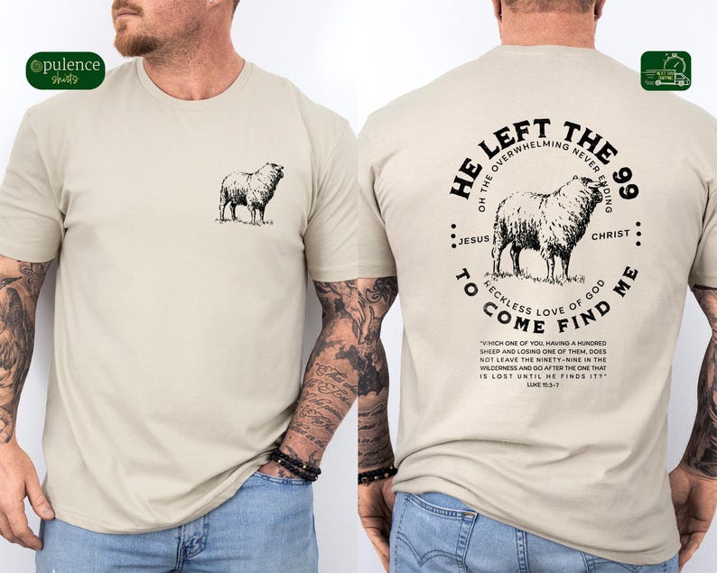 May include: A beige t-shirt with a black and white illustration of a sheep on the front and a circular design on the back. The design features a sheep, the words "He Left the 99", "On the Overwhelming Never Ending", "Jesus", "Christ", "To Come", "Reckless Love of God", "Find Me", and a quote from Luke 15:3-7.