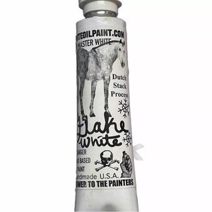 May include: A white tube of flake white oil paint with a black and white label featuring a horse, a snowflake, a skull and crossbones, and the text "Dutch Stack Process Flake White Danger Oil Based Paint Handmade U.S.A. Power to the Painters."