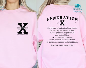 May include: Pink sweatshirt with a black graphic print of the letter "X" and the text "GENERATION X" with the years 1965-1980. The text below the graphic reads "Survivors of drinking hose water, blistering hot metal slides, little parental supervision and not getting participation trophies, known for our charming blend of cynicism, sarcasm and skepticism. The true FAFO generation."