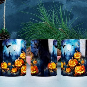 May include: Three white ceramic mugs featuring a wrap-around Halloween design. The print displays glowing orange jack-o'-lanterns, dark silhouettes of trees, flying bats, and a full moon against a deep blue and black night sky background.
