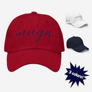 May include: Red baseball cap with the word "maga" embroidered in navy blue. The cap is available in three colors: red, white, and navy blue.