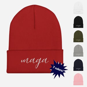 May include: Red knit beanie with the word "maga" embroidered in white on the front. The beanie is available in 7 colors.