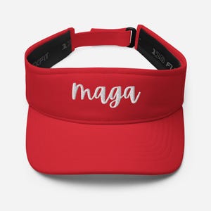 May include: Red visor with a white embroidered "maga" text.