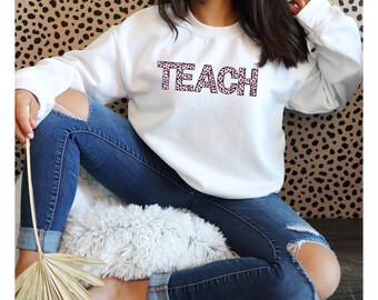 TEACH Sweatshirt with Pink Cheetah Print – Fun and Trendy, Perfect for Valentine’s Day or Everyday Wear, Multiple Sizes and Colors