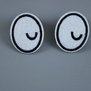 a pair of wink eyes patch, iron on patch, embroidered patch, aesthetic patch, funny patch, for jacket, for backpack,