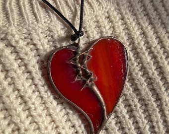 Colgante de corazón cosido
