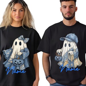 May include: Black t-shirts with matching ghost designs for Halloween. One ghost wears a bow and carries a pumpkin bucket, the other wears a baseball cap and holds a lantern. Both designs include the word "Name" in blue script.