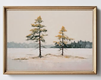 May include: A framed painting of two pine trees with yellow-green needles standing on a small island in a snowy landscape. The trees are silhouetted against a light gray sky.