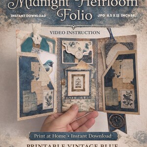May include: A printable vintage blue journal folio with the text "Midnight Heirloom Folio". The folio is open, revealing various pockets and decorative elements. The image includes the text "Printable Vintage Blue Journal Folio". The folio measures 21.6 x 27.9 cm.