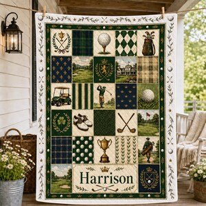 May include: A quilted throw blanket featuring a golf theme with patchwork squares displaying golf balls, clubs, a cart, a trophy, a player, and a clubhouse. The center bottom panel features the name Harrison in dark green text with a crown.