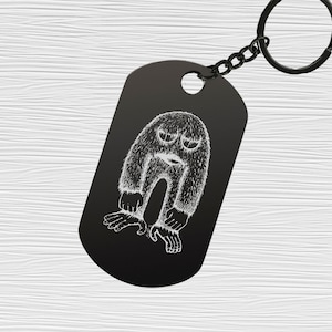 Médaille pour chien en acier inoxydable gravée au laser avec créature amusante, porte-clés avec pendentif, breloque pour sac, noir