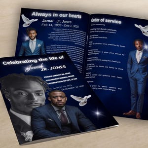 May include: A memorial program with a dark blue background. The cover reads "Celebrating the life of Jamal Jr. Jones." Inside, the program includes photos of the deceased and the order of service. White doves are featured.