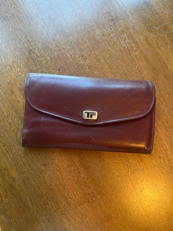 Vintage genuine leather women’s wallet. Trifold bu