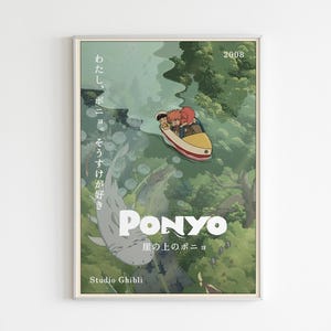 May include: A framed poster featuring the animated film "Ponyo." The artwork depicts a boat with characters, a large fish, and a lush green landscape. Japanese text and the year 2008 are also visible. The Studio Ghibli logo is at the bottom.