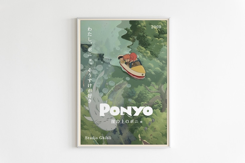 May include: A framed poster featuring the animated film "Ponyo." The artwork depicts a boat with characters, a large fish, and a lush green landscape. Japanese text and the year 2008 are also visible. The Studio Ghibli logo is at the bottom.