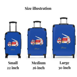 May include: Three blue suitcases with red fire truck designs and the name "Bruce" on each. The suitcases are 22 inches, 26 inches, and 30 inches.