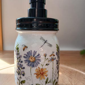 Dainty floral mason jar liquid soap or lotion dispenser.