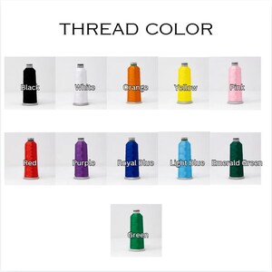 May include: A chart showing 11 different colors of thread spools. The colors are black, white, orange, yellow, pink, red, purple, royal blue, light blue, emerald green, and green.