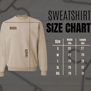 May include: A size chart for sweatshirts with measurements in inches. The chart shows the width and length of sweatshirts in sizes S, M, L, XL, and XXL.