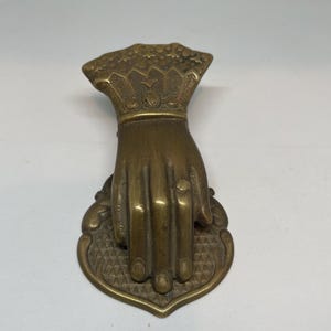 Genuine antique Victorian brass hand paper holder