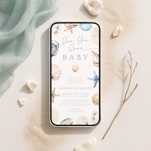 May include: A smartphone displays a baby shower invitation with a beach theme. The invitation features seashells, starfish, and the text "Sea You Soon BABY." The invitation is surrounded by decorative elements like seashells and a sprig.