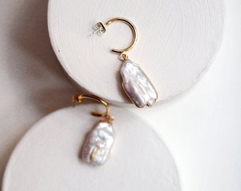 Large Pearls hoops earrings, gold plated in a luxury gift packaging.