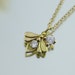 see more listings in the 14k Solid Gold Necklace section