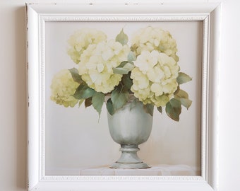 May include: A framed print of a still life featuring a bouquet of white hydrangeas in a light blue vase. The vase has a pedestal base and is sitting on a white surface. The print is framed in a white frame with a distressed finish.