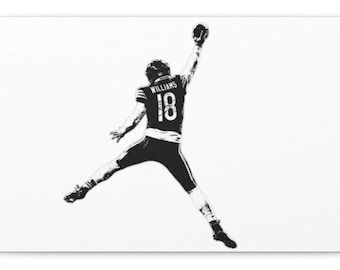May include: A black and white graphic illustration of a football player in mid-air, reaching upward with a ball. The player wears a jersey with the name WILLIAMS and the number 18 on the back. The design features high-contrast ink-style lines.