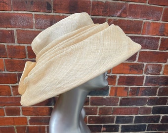 Stunning Formal Cream Sinamay Hat with self coloured bow to the back of the hat