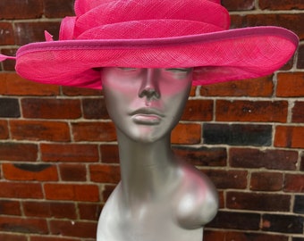 Stunning Formal Hot Pink Sinamay Hat with self coloured feathers and sinamay twists