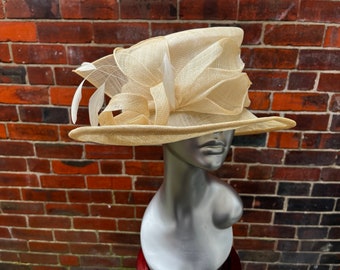 Stunning  formal cream Sinamay Wedding Hat with sinamay flowers and matching feathers