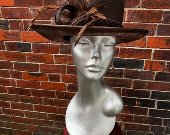 Stunning Brown  Sinamay Wedding Hat with match sinsmay twirls  and matching feathers