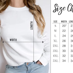 May include: A white sweatshirt with a size chart. The chart lists sizes S to 5XL, with corresponding measurements for width, length, and sleeve length in inches. The word "WIDTH" and "LENGTH" are labeled on the sweatshirt.
