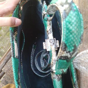 The Python Leather Bag in Tosca Green – Size M combines luxury, versatility, and timeless elegance