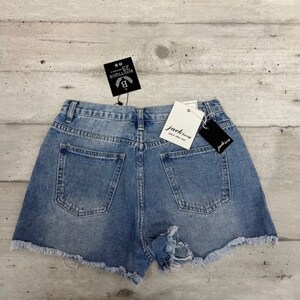 Damesmeisjesshort met blauwe studs afbeelding 5