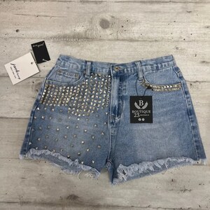 Damesmeisjesshort met blauwe studs afbeelding 1