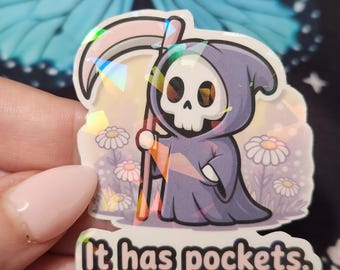 It Has Pockets Grim Reaper Sticker – Pastel Goth Humor Vinyl Decal